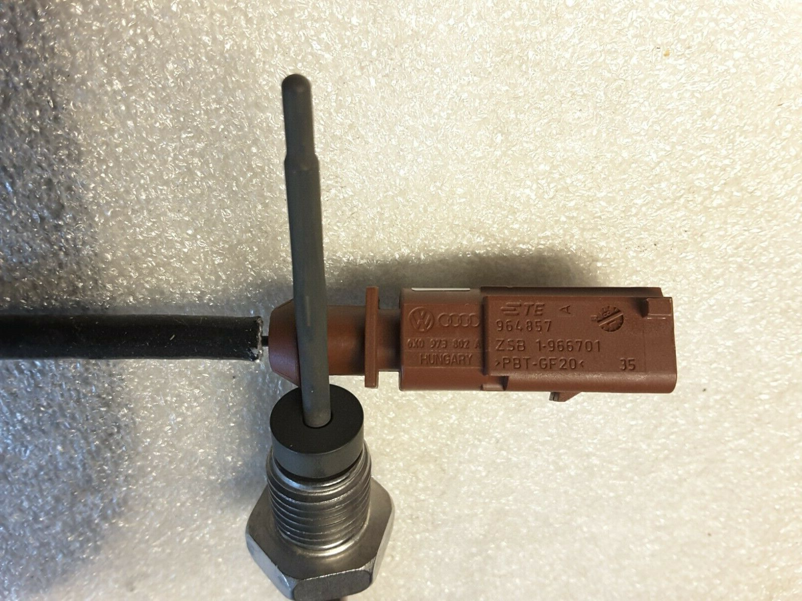 Sensor de temperatura de gases de escape 04L906088DP Original VW, compatible con varios modelos VAG, Nuevo.